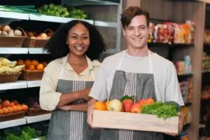 Five hospitality staff smiling