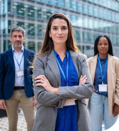 Confident business professional with her team in Maple Ridge