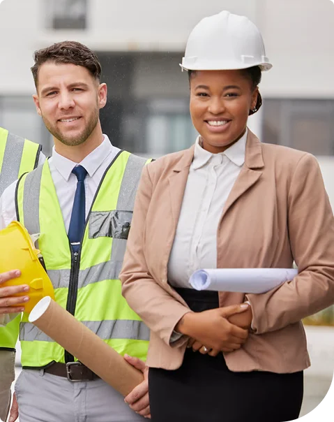 Construction worker and site manager in hard hats in White Rock
