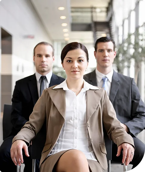 Business team with a woman seated in front in Port Coquitlam
